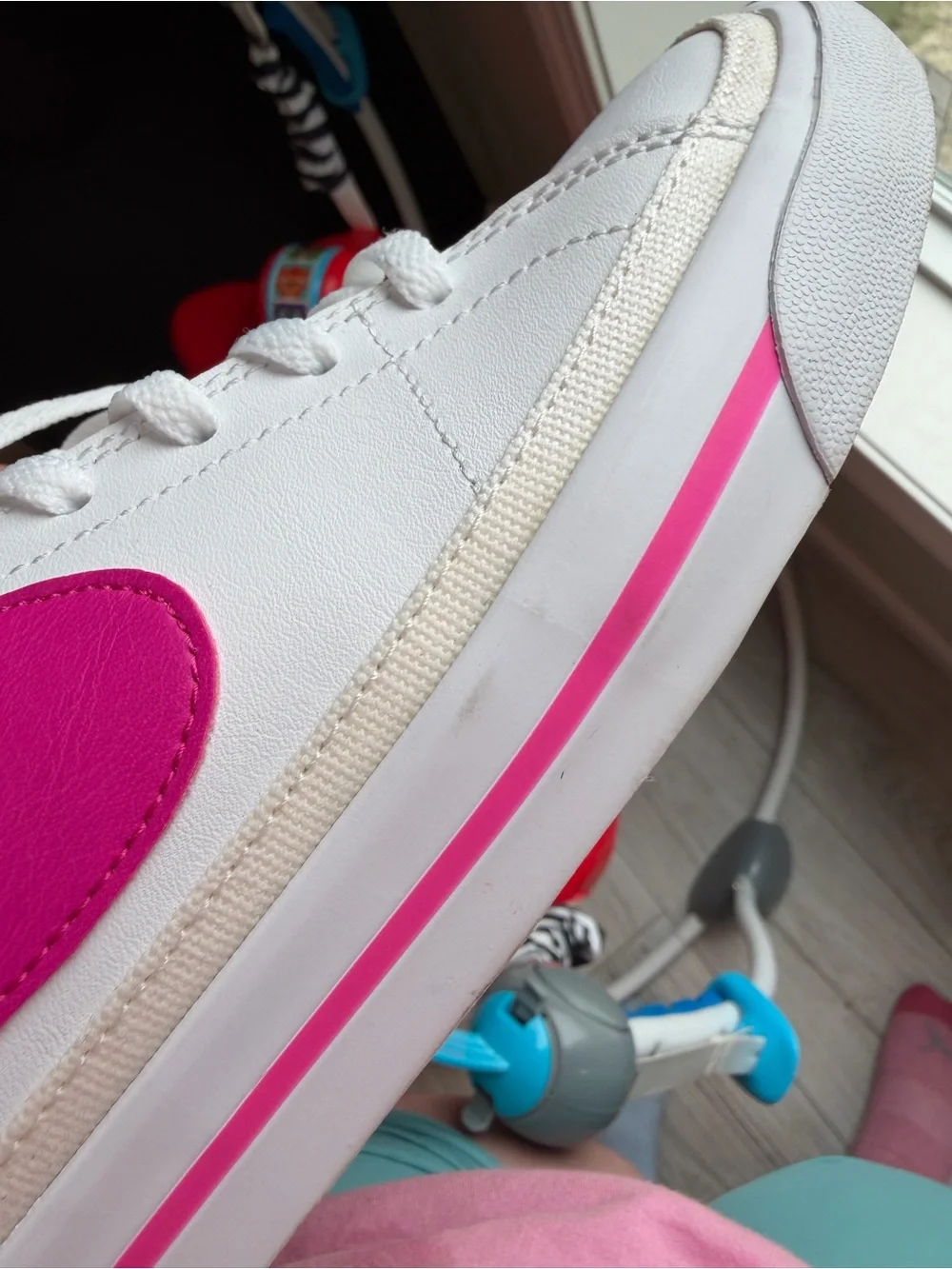 Nike White Sneakers with Pink Swoosh and Accent Stripe